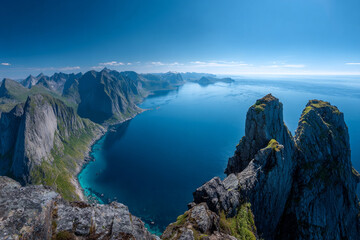 Fototapeta premium Experience the breathtaking beauty of Norway's Lofoten Islands with stunning turquoise waters and majestic mountain peaks under a clear blue sky, perfect for travel ads