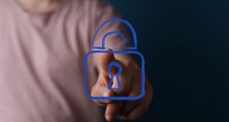 Secure your data. Image of a hand interacting with a digital padlock icon, symbolizing online...