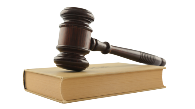 Justice gavel rests on law book, symbolizing legal authority