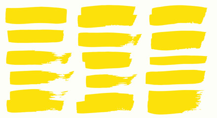 Obraz premium Collection of Bright Yellow Brush Strokes and Painterly Swatches for Graphic Design Applications