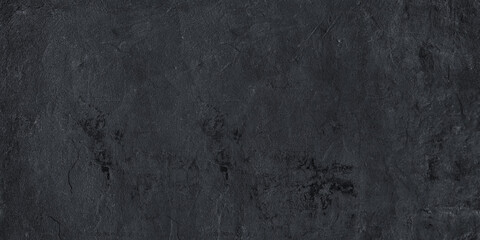 Schieferwand im Licht.Black texture dark slate background. Stone concrete surface.Dark grey black...