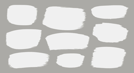 Abstract White Paint Brush Strokes on a Neutral Gray Background Representing Art and Design Elements for Creative Projects