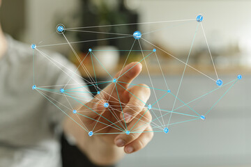Close-up of a hand touching a digital network concept, illustrating technology, connectivity, and innovation. Represents data, communication, an