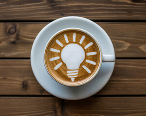 Start your day with inspiration having a lightbulb latte art drink to spark creativity and energize your innovative business ideas