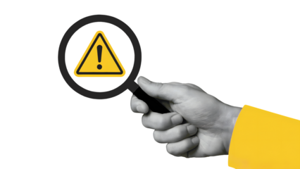 Hand holding magnifying glass over yellow warning sign and yellow sleeve on transparent background