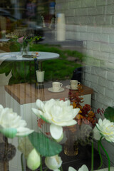 Coffee shop display seen through glass