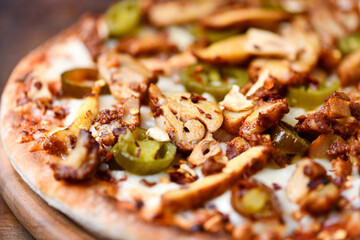 Gyros Pizza with jalapeno pepper and mozzarella cheese. Soft focus. Close up.	