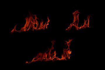 Blazing fire and glowing flames on a dark background perfect for creative design and visual effects.
