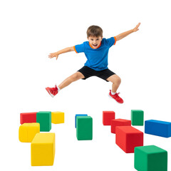 Child Jumping Over Foam Blocks in Play