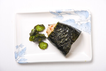 貧相なお昼ご飯（おにぎり）のイメージ写真