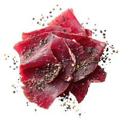 Close-up shot of thinly sliced, cured meat arranged artfully with peppercorns