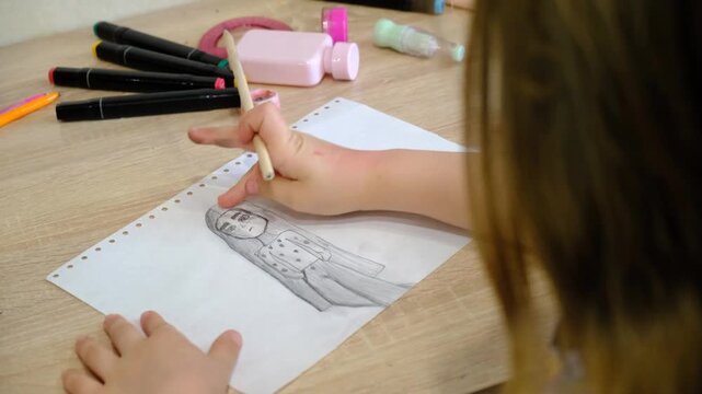 Child, teenager girl drawing sketch picture, crying girl. Hand drawing Anime person, sad girl, emo. Youth culture