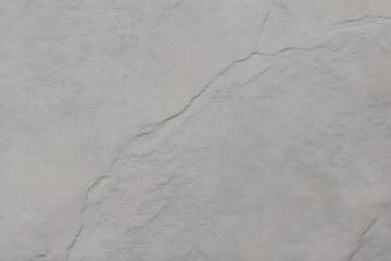 Textured stone surface closeup, natural gray slate wall texture