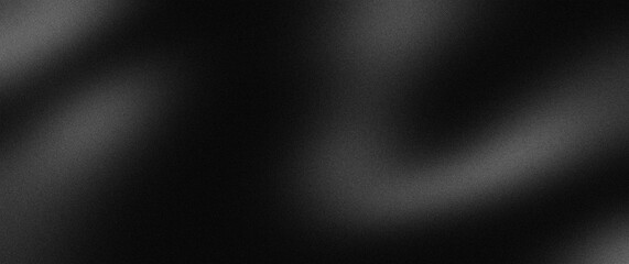 black, opaque background with fine grain texture noise. perfect abstract background often used in graphic design, photography, or as wallpaper.