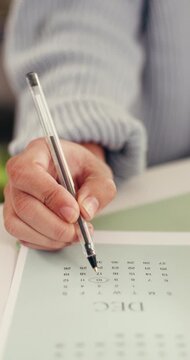 Startup, hands and writing on calendar for planning, schedule appointment and reminder. Person, entrepreneur and circle date in small business for time management, important day and deadline agenda