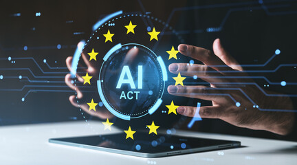 European AI Act concept with holographic interface above tablet and hands interacting with digital elements in futuristic tech environment.