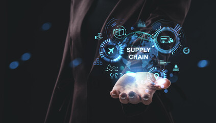 Futuristic supply chain concept with holographic interface floating above open hand in business setting on dark background..