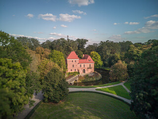 Obraz premium A brick Gothic castle in Oporow, Poland. 