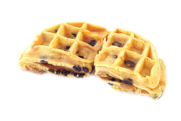 Chocolate chip waffles on white background. Crispy golden homemade dessert with fluffy texture and rich aroma, ideal for breakfast menu, bakery advertisement, or food blog concept.      