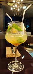 Refreshing cocktail with mint and citrus served in a glass  