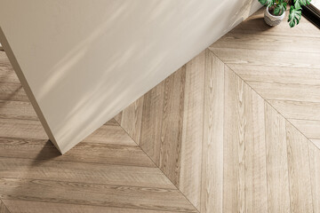 Naklejka na ściany i meble Top view of an empty interior with chevron wood flooring, soft lighting, and minimal decor. Ideal for backgrounds, mockups, or interior design presentations. 3D render.
