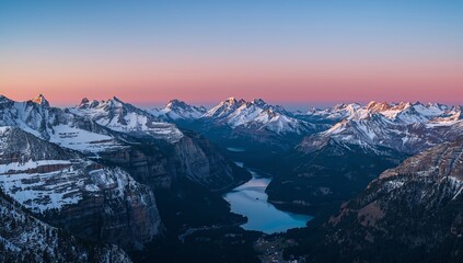 Obraz premium Majestic Peaks and Azure Waters at Sunrise, a Panorama of Natures Grandeur.