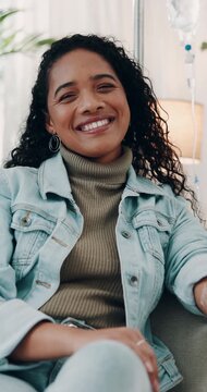 Woman, IV drip and face in clinic for wellness, health and vitamin c fluid with chamber. Healthcare, medicine and person with smile for immunity, nutrients or intravenous therapy at consultation