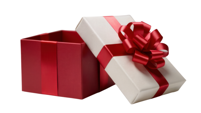 A festive red gift box with a white lid tied with a luxurious red ribbon and bow isolated on transparent background