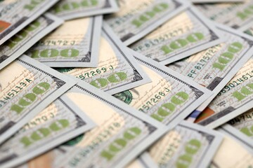 United States Dollar currency money bills. USD currency banknotes in stack with different...