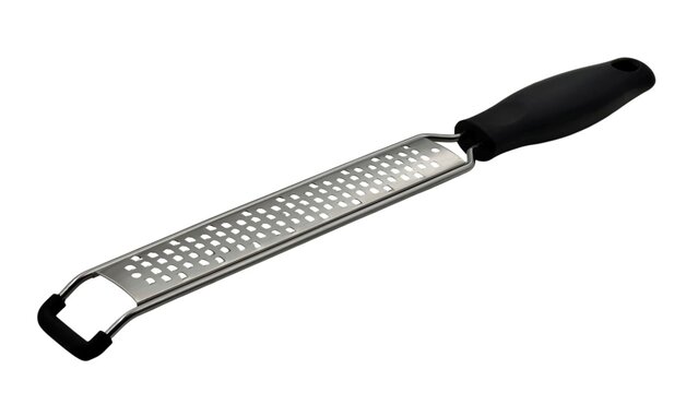 Photo of a stainless steel grater zester kitchen tool with razor-sharp blades, ideal for cheese, lemon, nutmeg, and zesting in cooking or baking, isolated on white background.