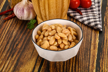 Baked white canned beans in the bowl