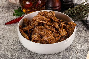 Shredded slow cooked pork meat