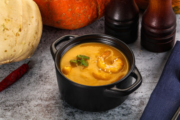 Pumpkin cream soup with prawns