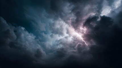 Obraz premium A dramatic lightning bolt illuminates dark turbulent storm clouds in a powerful atmospheric display