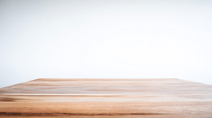 Fototapeta premium overhead. Minimalist wooden desk in a cozy living room, softly lit for a clean and uncluttered aesthetic. lifestyle magazines.