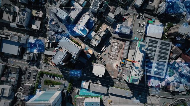 現代都市と道路の真俯瞰ドローン空撮とデジタルテクノロジーのコンセプトイメージ