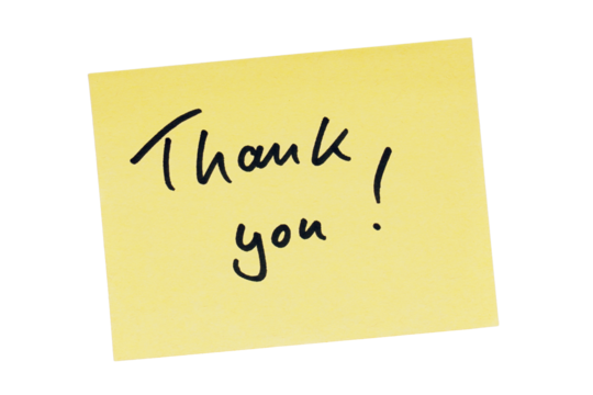 handwritten thank you note in black ink on yellow paper