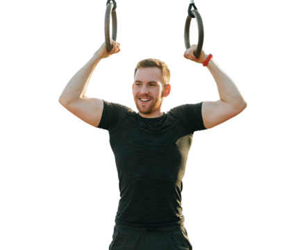 Young man training on gymnastic rings against transparent background. - Powered by Adobe
