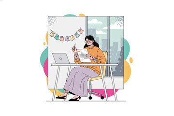 Focused woman working remotely at festive Halloween office desk with laptop and city view