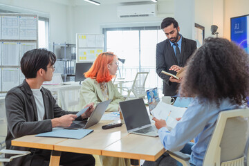 group of multicultural male and female professionals meet inside a contemporary office, leveraging artificial intelligence and big data analytics to brainstorm, exchange ideas, and build adaptive 