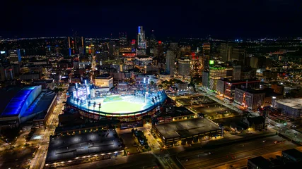 Poster Stadion Comerica Park and Detroit skyline at night. Drone aerial photo of Comerica Park stadium and downtown Detroit skyline illuminated at night.  © Vadim