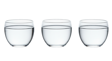 Three clear glasses filled with water on white background, minimalist concept for hydration, refreshment, or health lifestyle