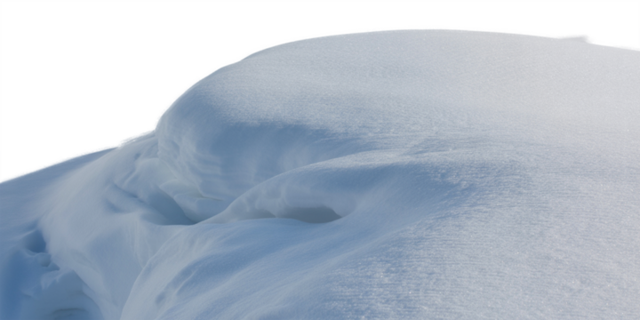 Close-up of a snowdrift showing smooth curves and textures ideal for winter backgrounds or seasonal designs