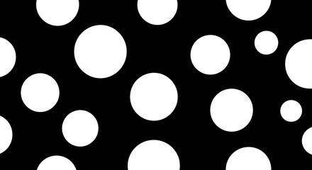 Black field scattered with various-sized white circles