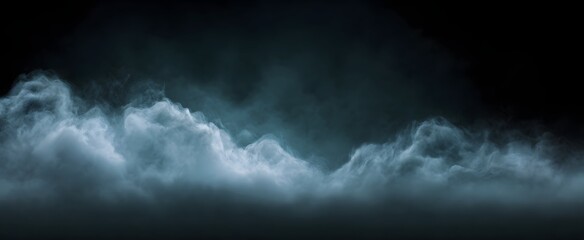 Obraz premium Rolling slate mist cloud drifts softly against a dark moody background.