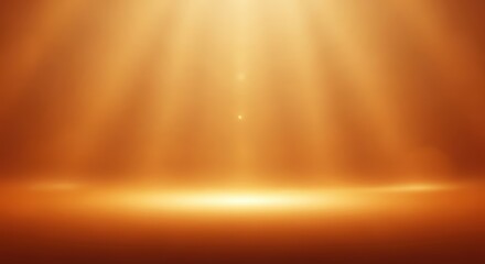 Warm orange light beams illuminate a stage or studio floor with a bright spotlight effect.