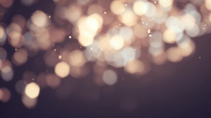 Fototapeta premium Warm golden bokeh lights creating a soft abstract background.
