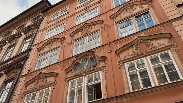 Detailed views of stunning historical architecture in Prague, Czech Republic, showcasing ornate Renaissance detailing, metalwork, and intricate Art Nouveau facades with mosaics and sculptures.