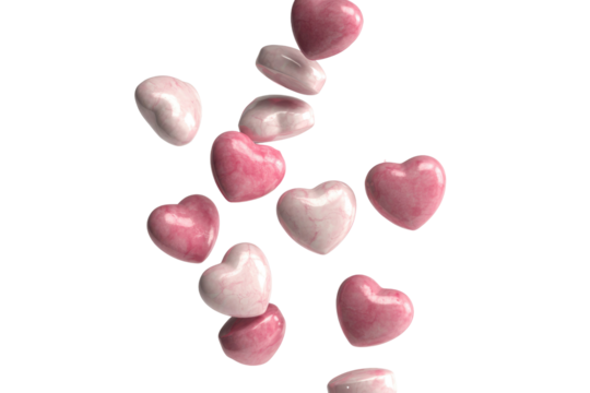 Pink and white marble heart shapes falling against a transparent background. background removed
