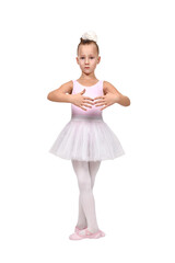 Girl in ballet pose wearing a pink leotard